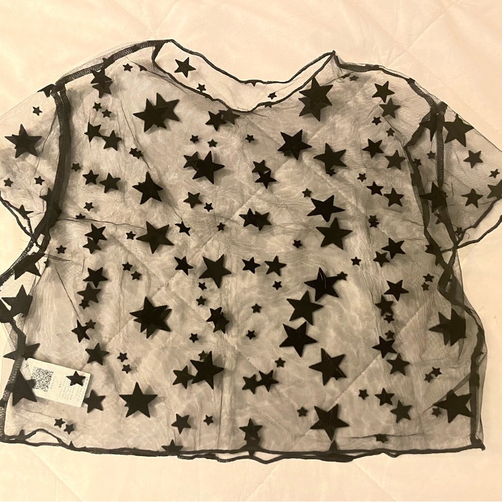 Sheer large crop top with black velvet stars.